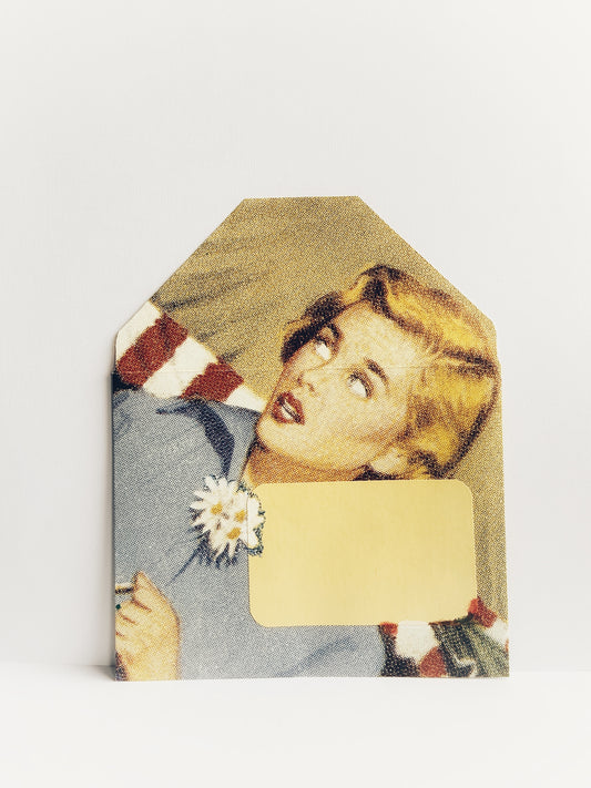 Envelope with pop culture scene of a woman holding daisies, from The Mysterious Case of Nancy Drew & The Hardy Boys