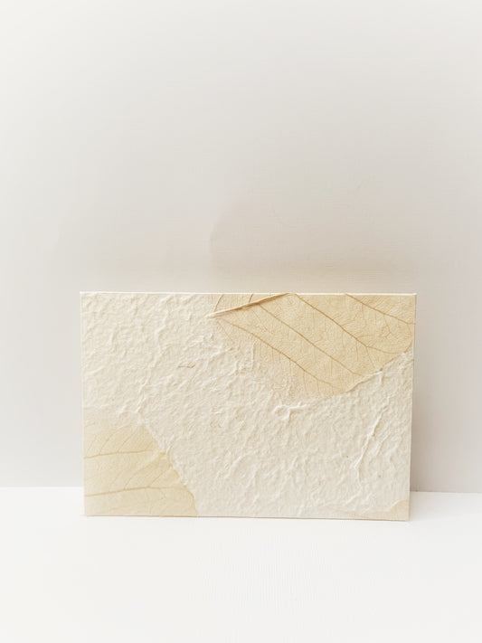 Front of handmade envelope made from ivory textured handmade paper from Thailand.
